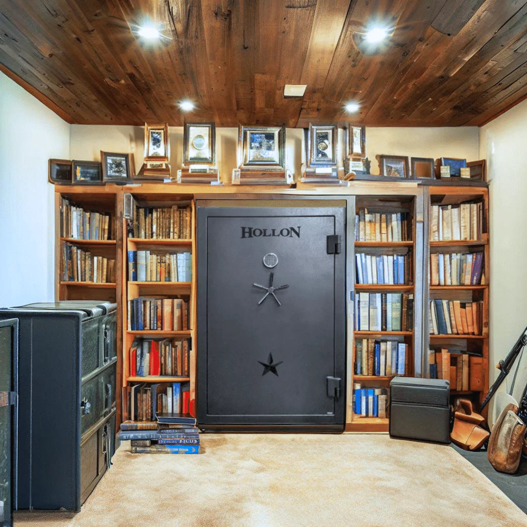Hollon RG-39E Republic Series gun safe in a basement surrounded by books on shelves